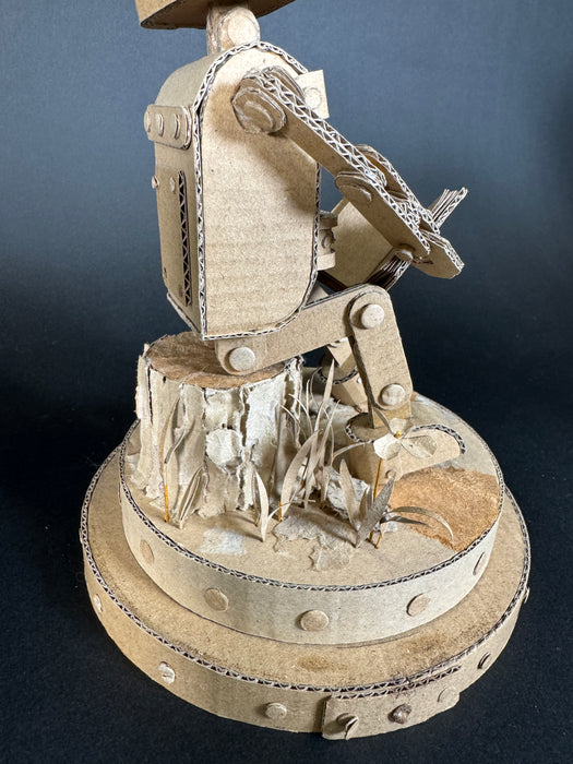 Paper Robot (Reading on stump)