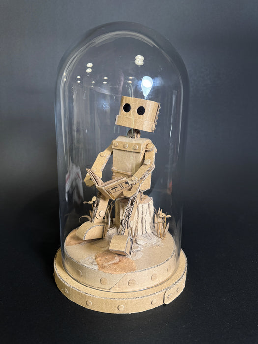 Paper Robot (Reading on stump)
