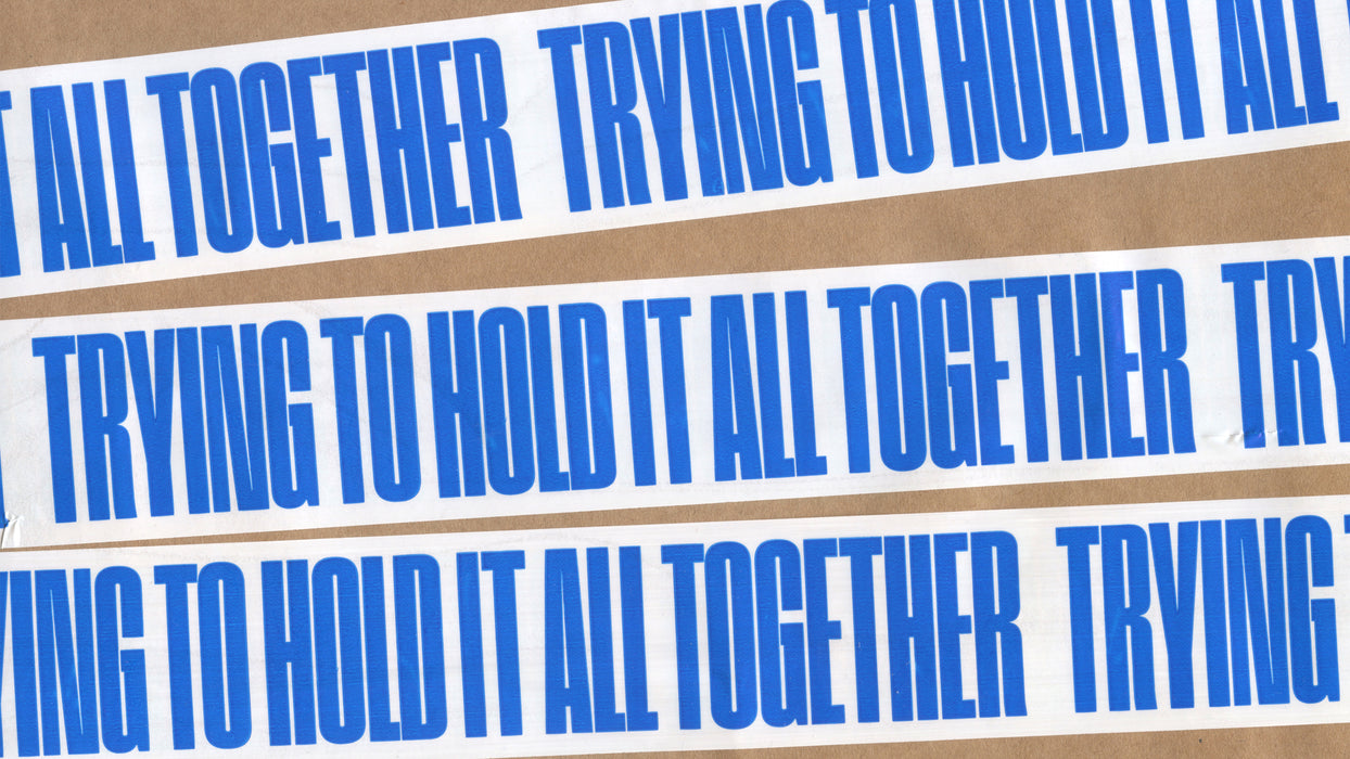 TRYING TO HOLD IT ALL TOGETHER